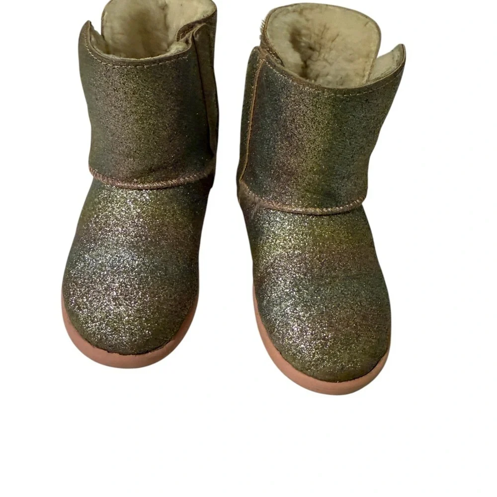 UGG’s Sparkly Gold and Pink Boots.